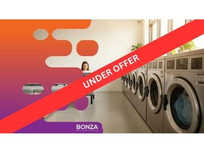 36763-under-offer-spacious-laundrette-with-commercial-grade-equipment-1