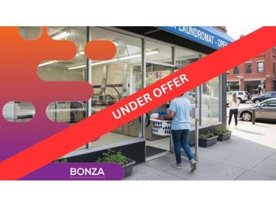 36763-under-offer-spacious-laundrette-with-commercial-grade-equipment-2