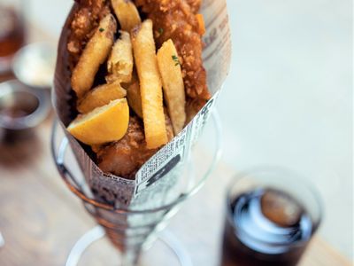 busy-fish-and-chips-with-highly-automated-equipment-great-takings-2410252-2