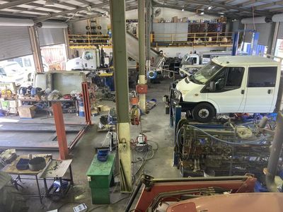 established-bus-company-with-freehold-commercial-property-6