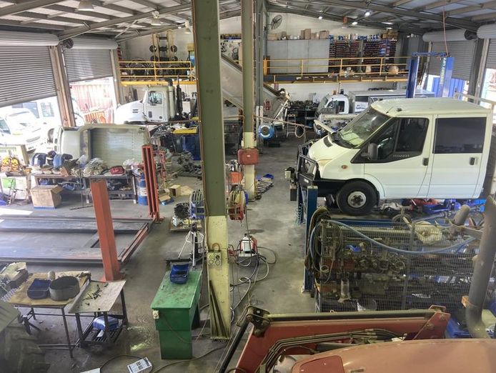 established-bus-company-with-freehold-commercial-property-6